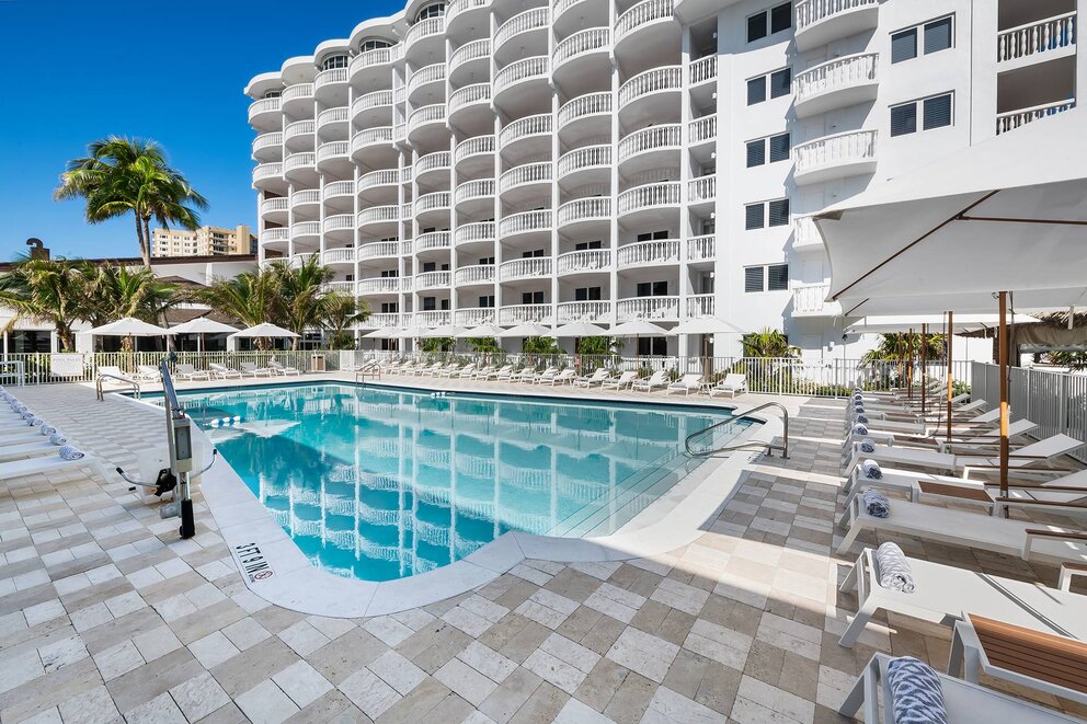 Main pool area with hotel main tower