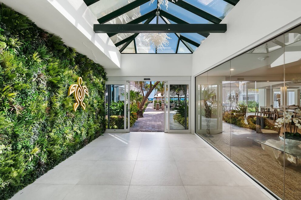 Living wall foyer from lobby to pool area