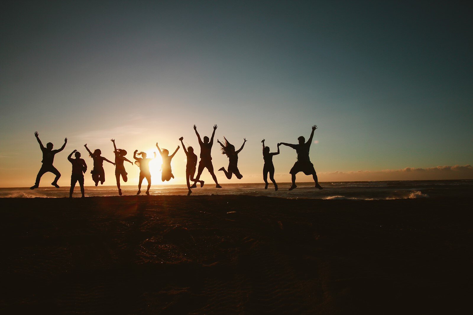 Group on the beach celebrating