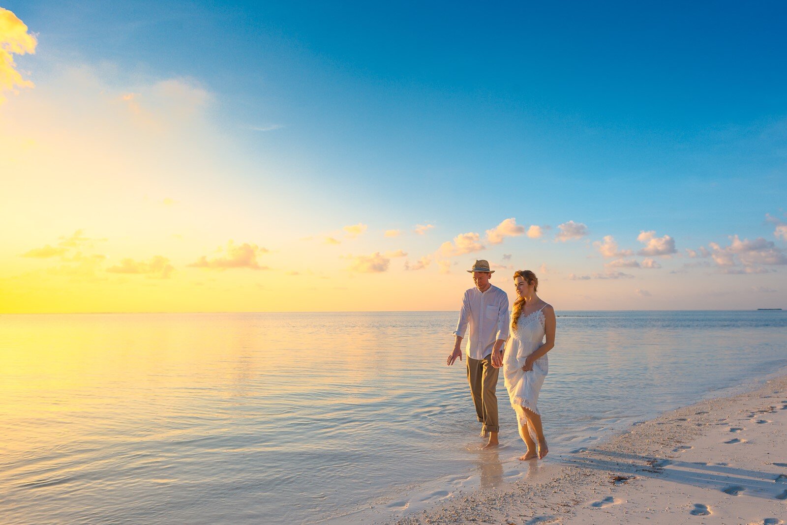 Couple walking on the beach